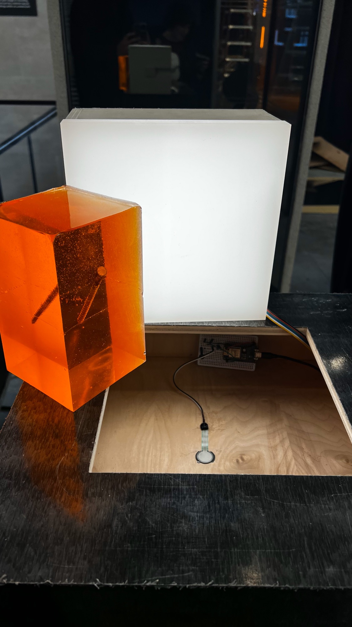 The cube on the podium